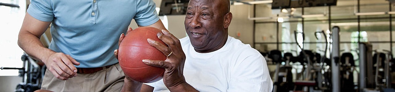 man with physical therapist